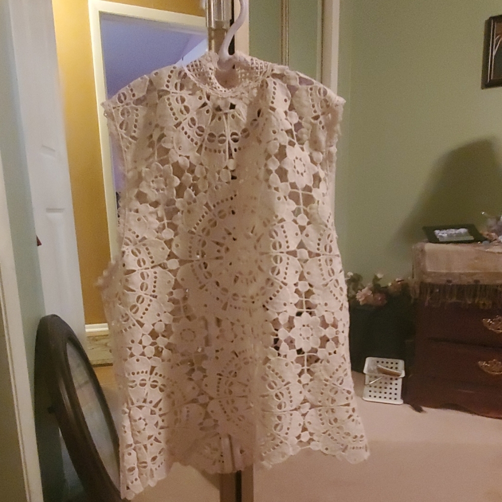Sleeveless dressy see through blouse